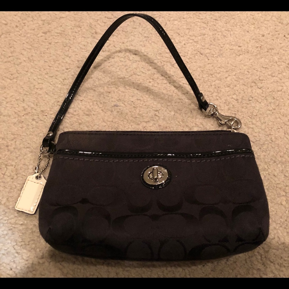Black monogrammed Coach wristlet